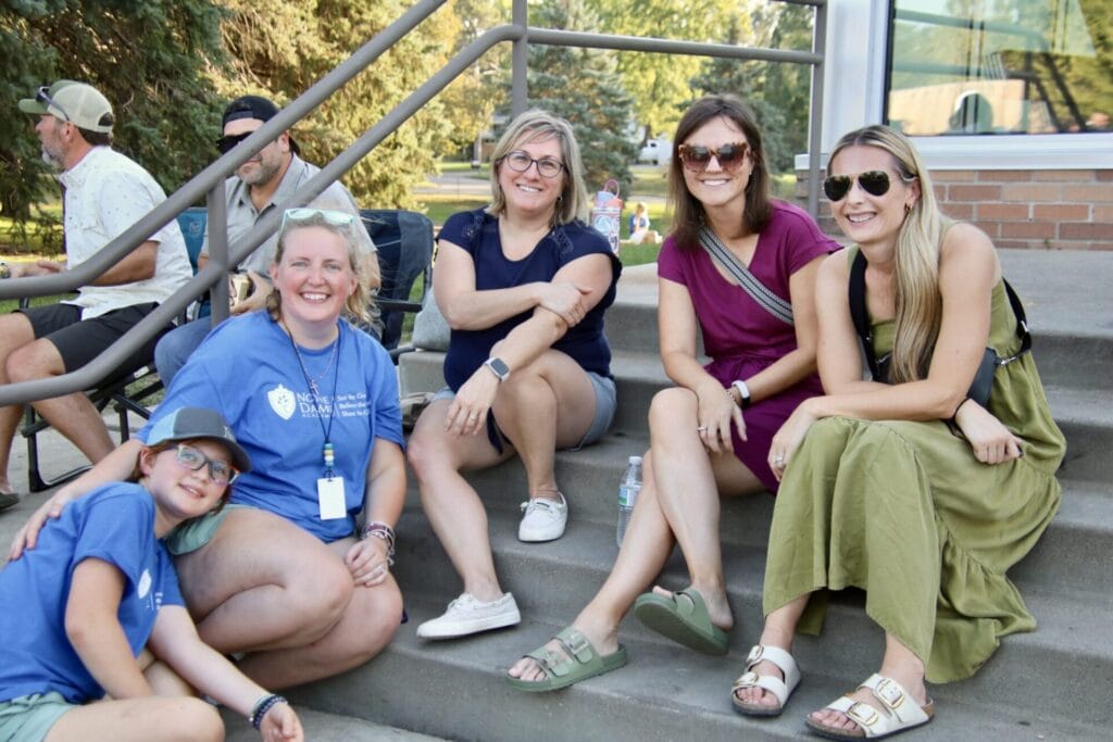Parents enjoy the Fall Festival.